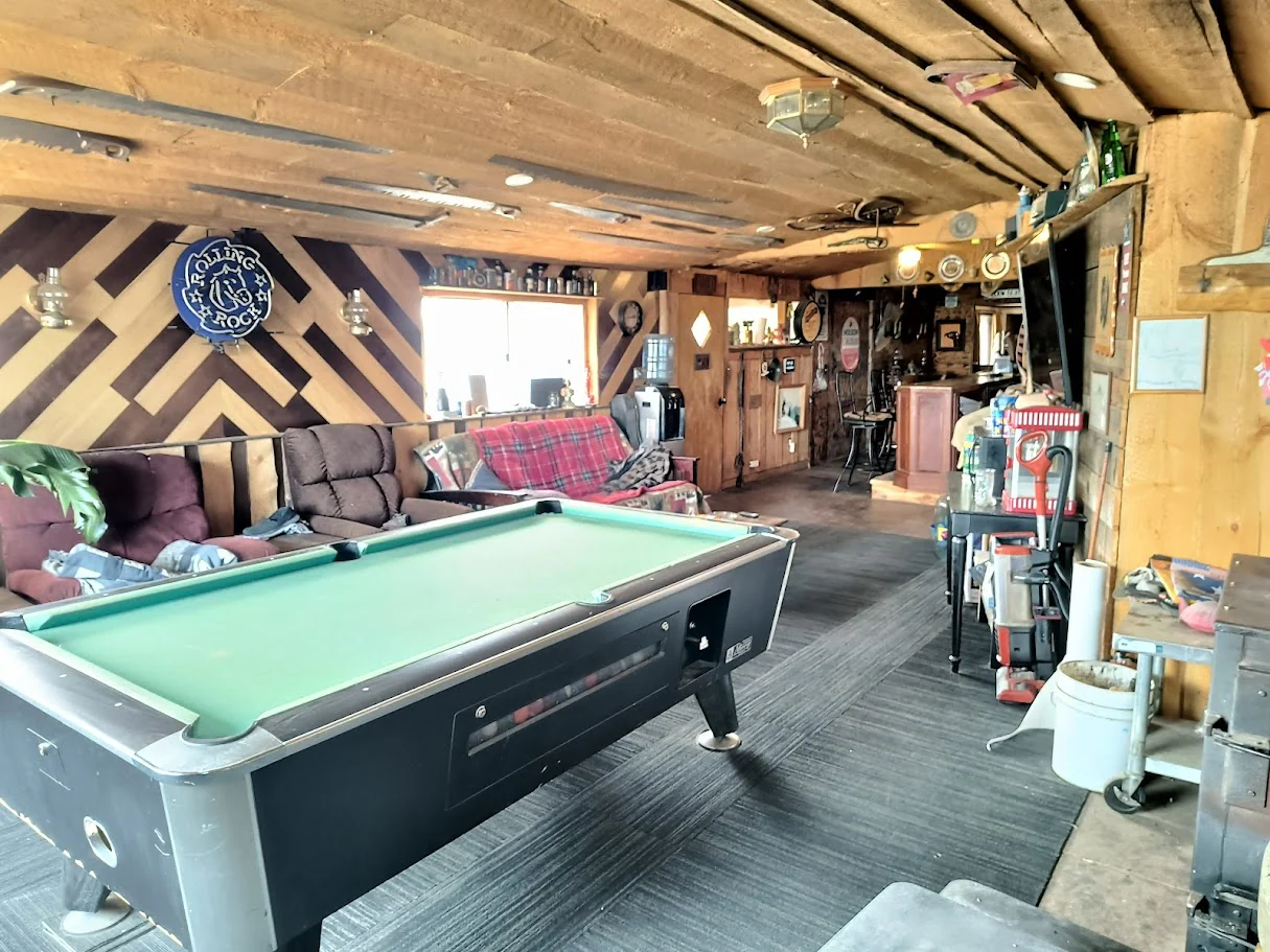 Pool table and chevron wall